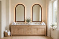 Custom lit walnut arch mirror — back-lit vanity mirror