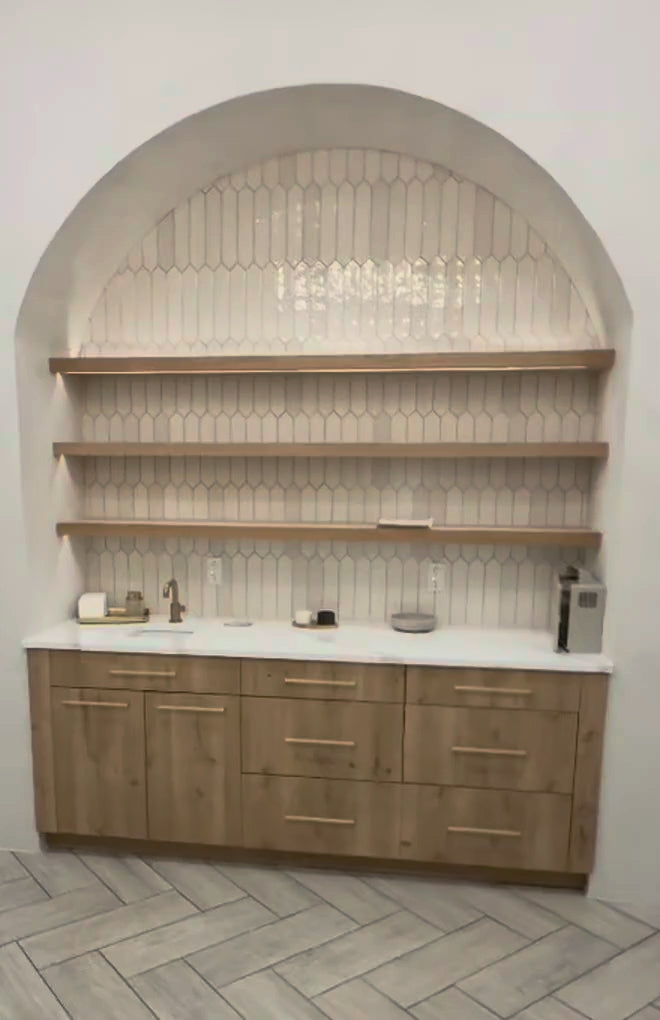Video: lighted shelves in a spa treatment room arch